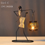 Girl iron candlestick decoration
