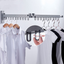 Balcony folding telescopic clothes rack