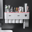 Toothpaste dispenser toothbrush rack